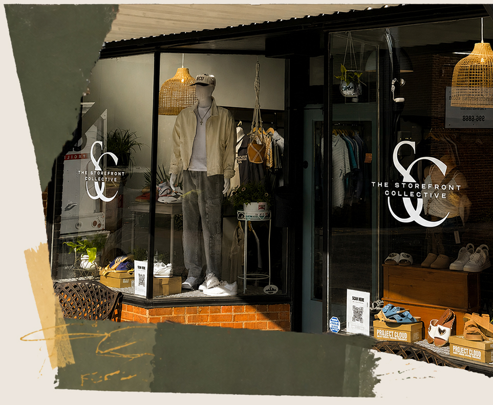 a splash image showing the front display windows of The Storefront Collective